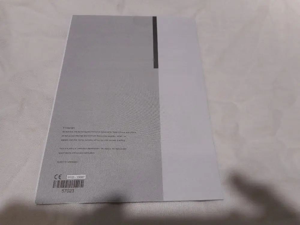 Grau-blätterner Katalog oder Handbuch von Remeha, auf einem hellen Untergrund, mit Barcode und Copyright-Hinweisen auf der Rückseite.